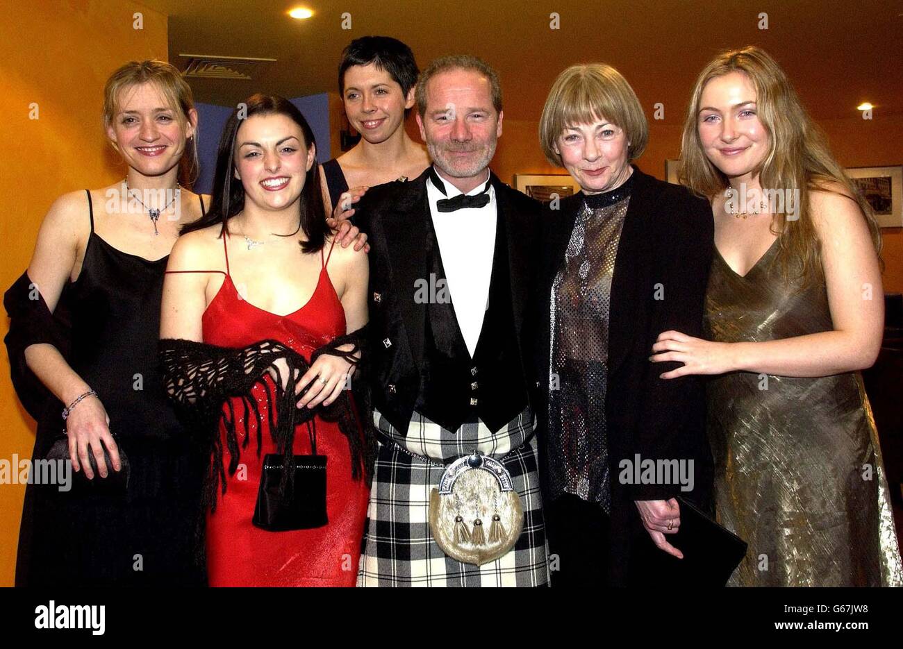 Director Peter Mullan with his leading ladies (L-R Nora Jane Noone, Anne Marie Duff, Eileen Walsh, Geraldine McEwan and Dorothy Duff at the UK Premiere of his movie 'The Magdalene Sisters' at UGC Glasgow. * The film which has received multiple Bafta nominations, is based on the true accounts of the Magdalene laundries in Ireland in 1964. Stock Photo