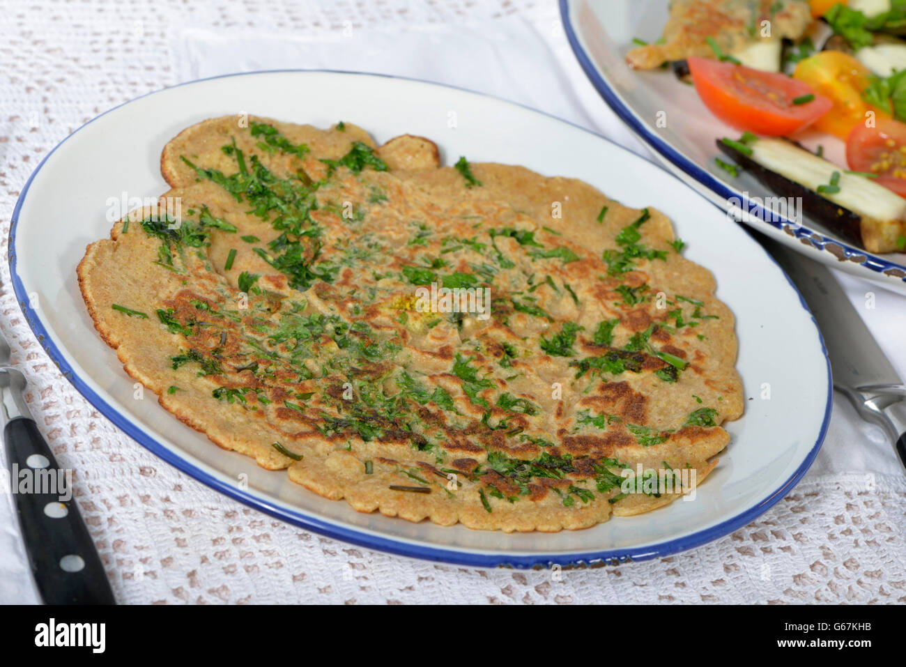 Spelt pancake with herbs Stock Photo