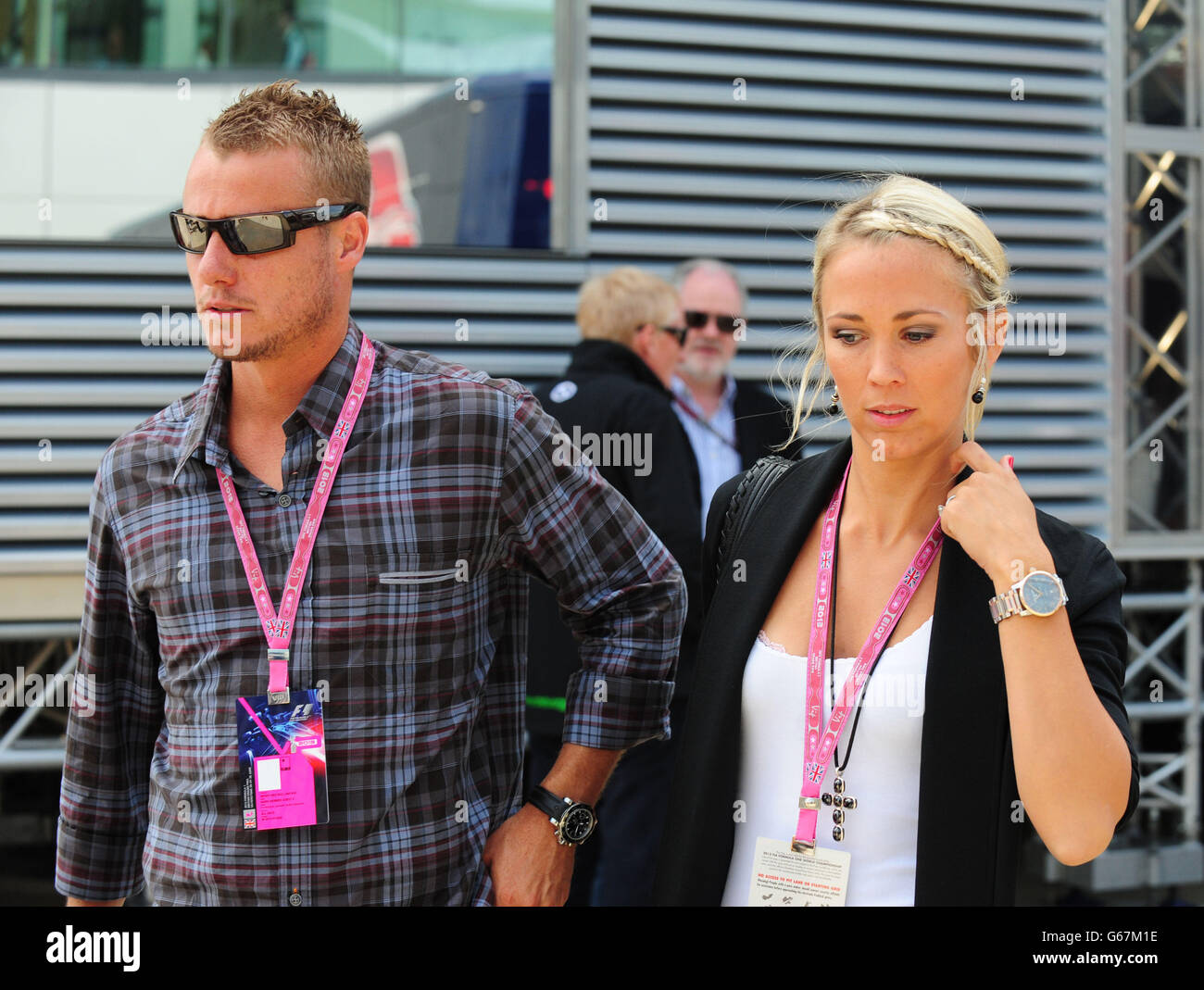 Lleyton Hewitt and Bec Cartwright during the 2013 Santander British Grand Prix at Silverstone Circuit, Towcester. Stock Photo