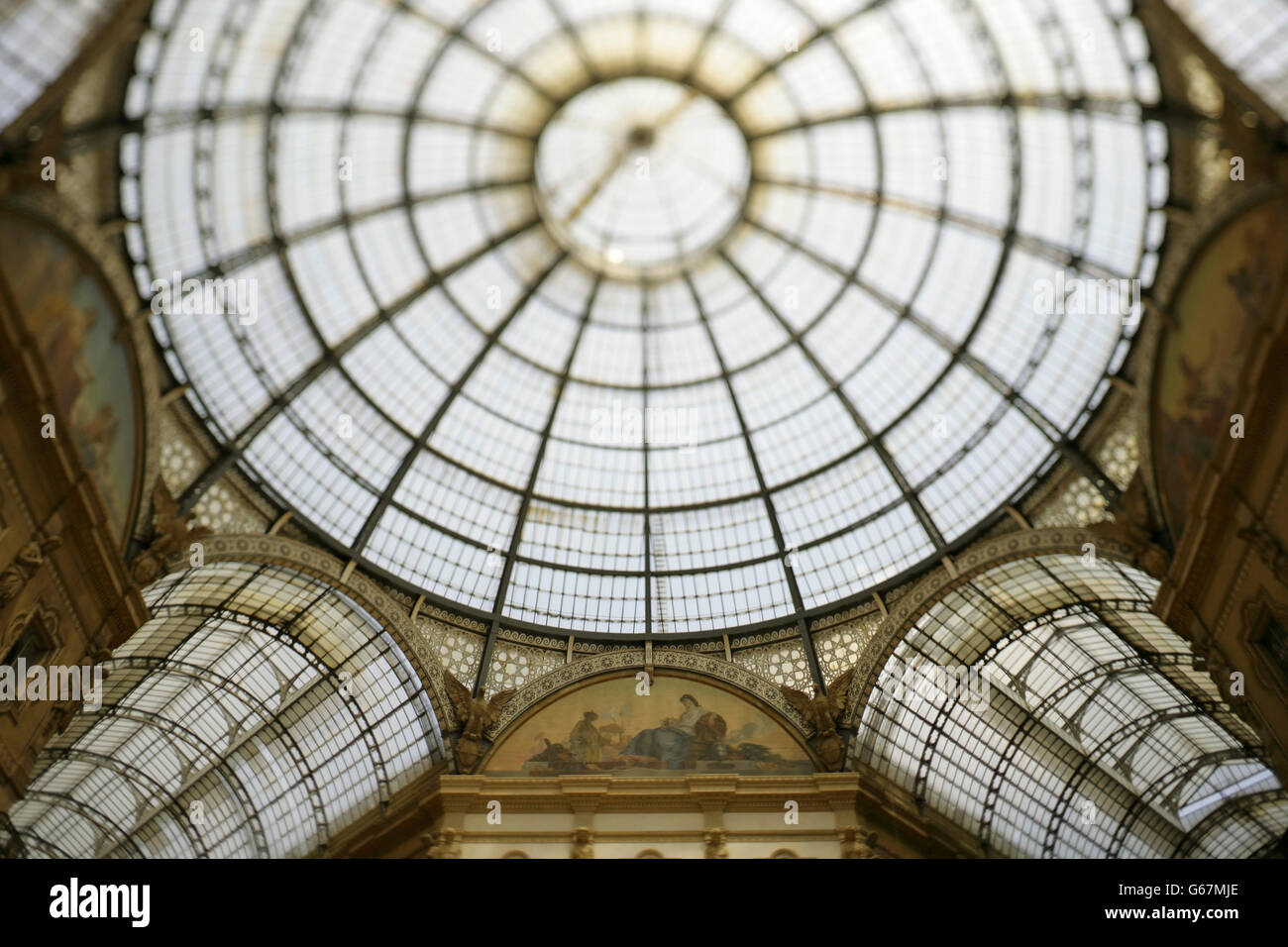 Glass and wrought iron canopy of the Galleria Vittoria Emanuele II, Milan, Italy. Stock Photo