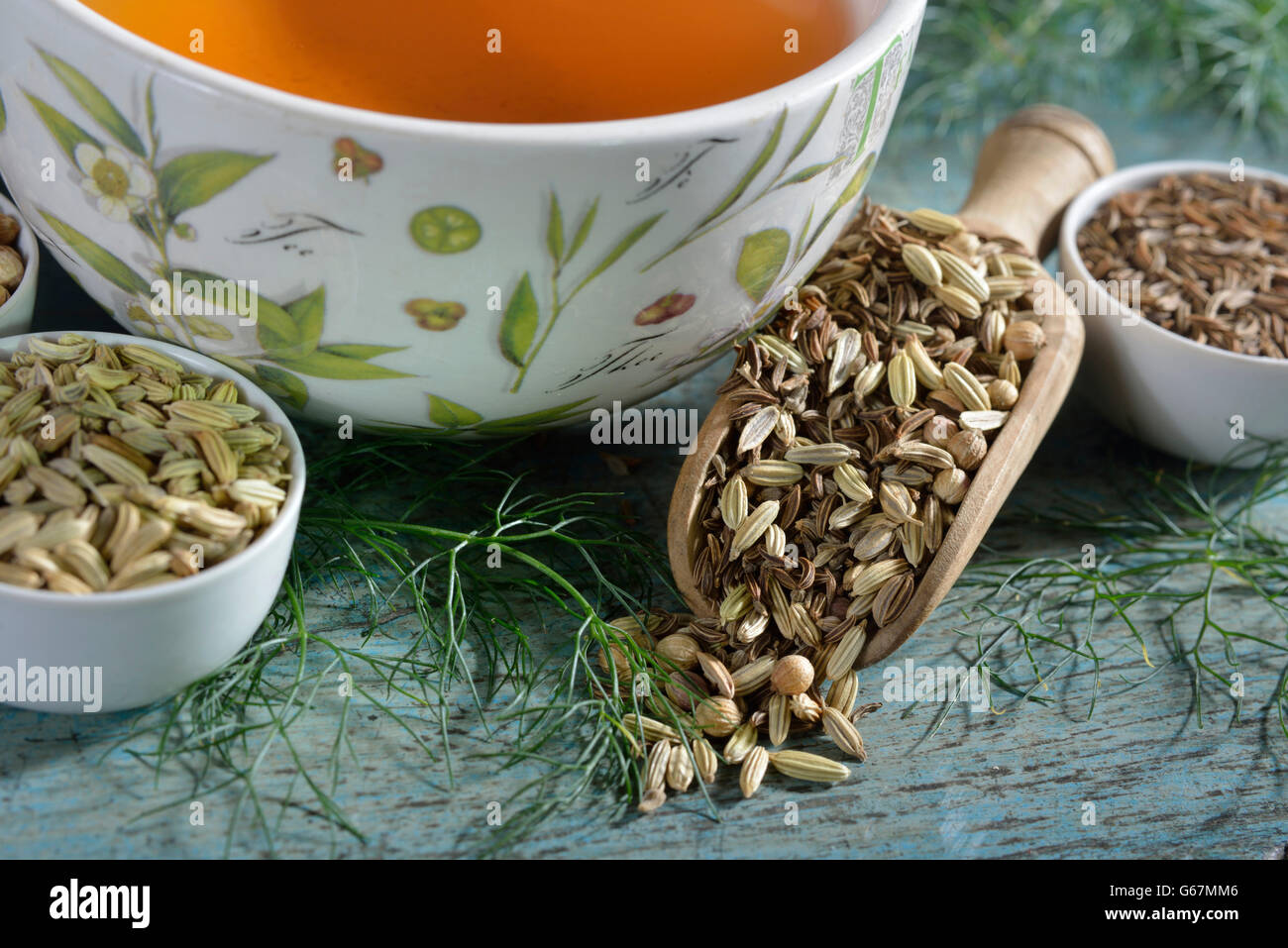 cup of tea with anise, fennel, annual caraway, coriander seed