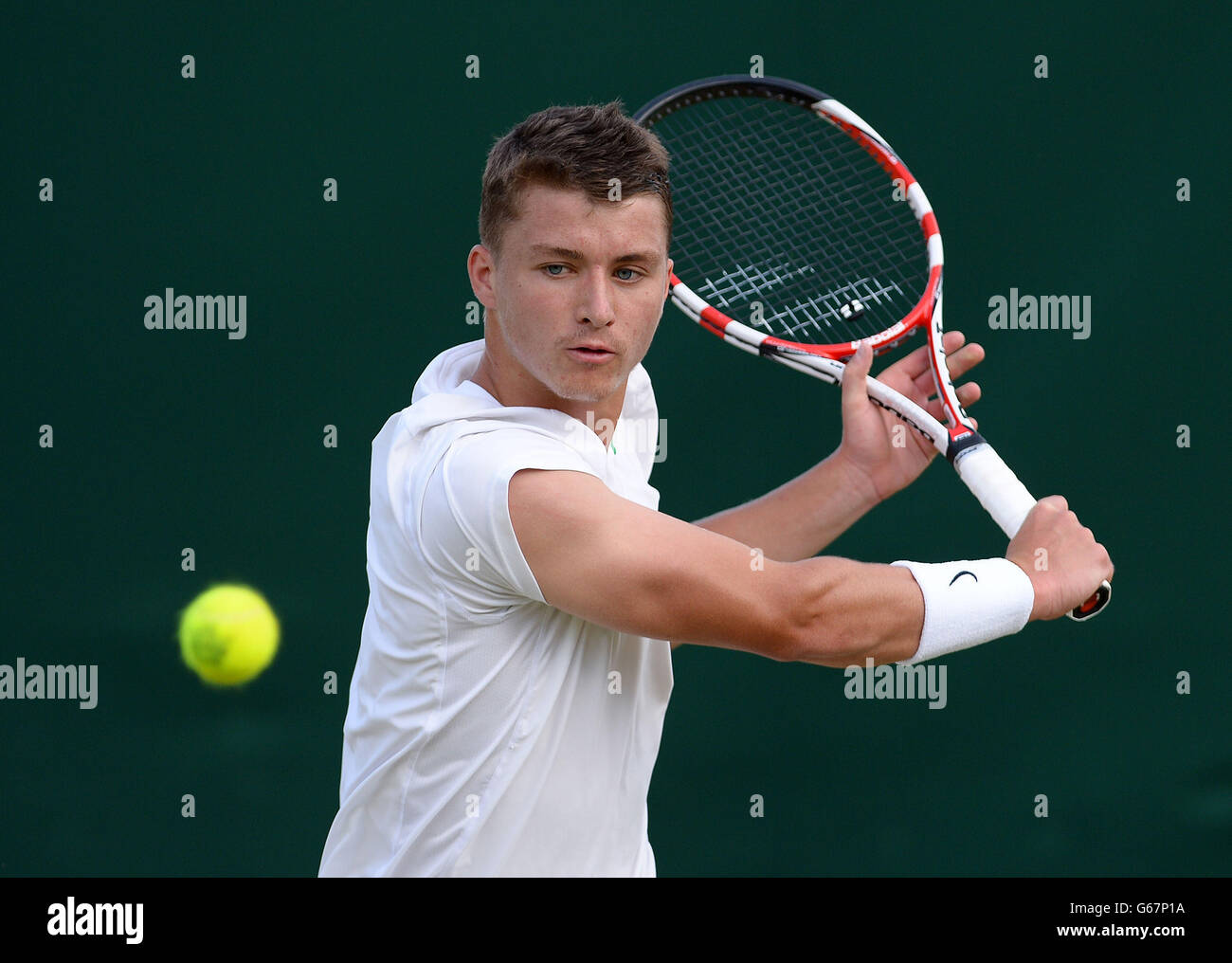 Great Britain's Jonny O'Mara in his Boy's Singles match against France's Maxime Janvier during day seven of the Wimbledon Championships at The All England Lawn Tennis and Croquet Club, Wimbledon. Stock Photo