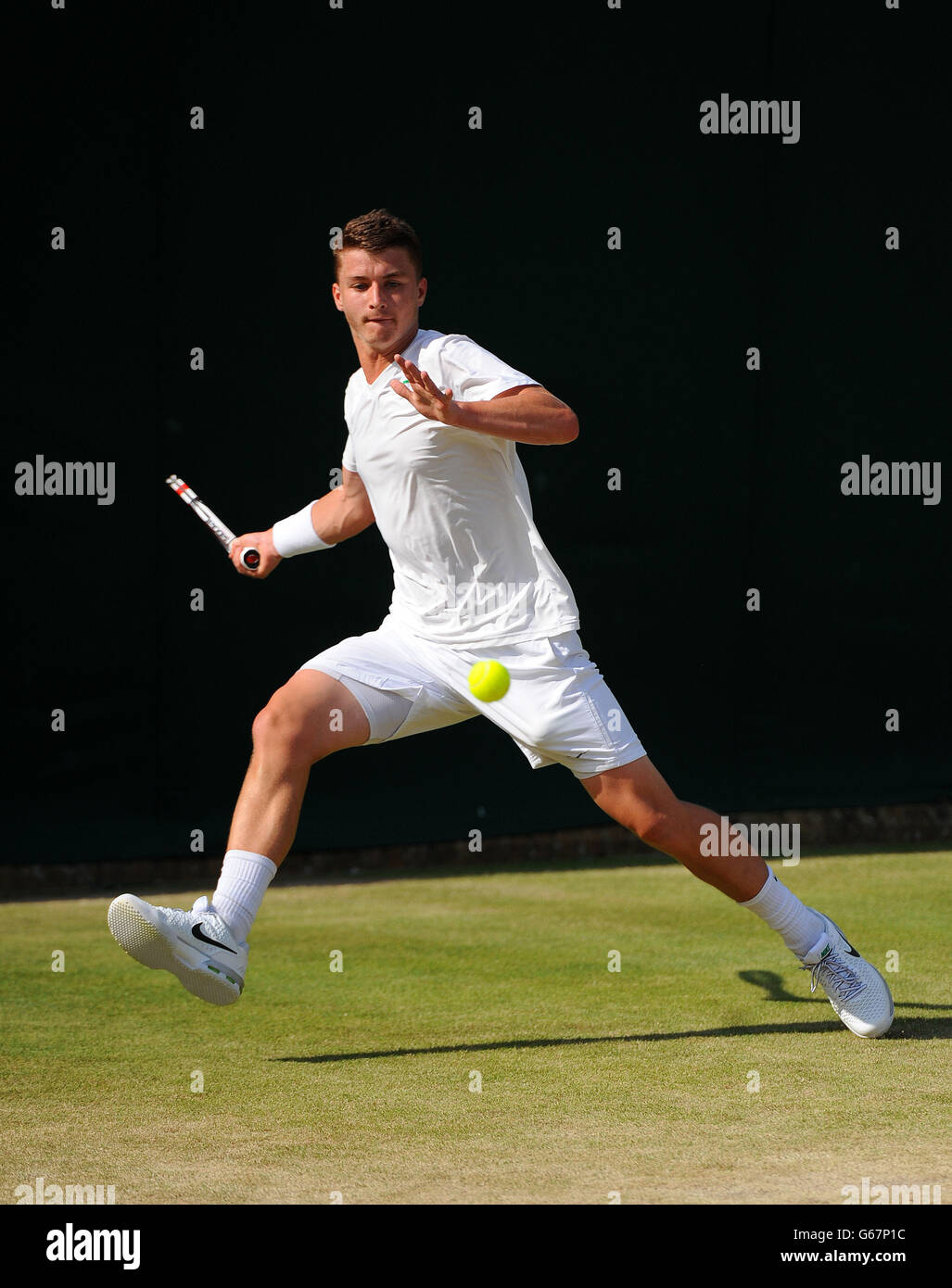 Great Britain's Jonny O'Mara in his Boy's Singles match against France's Maxime Janvier during day seven of the Wimbledon Championships at The All England Lawn Tennis and Croquet Club, Wimbledon. Stock Photo