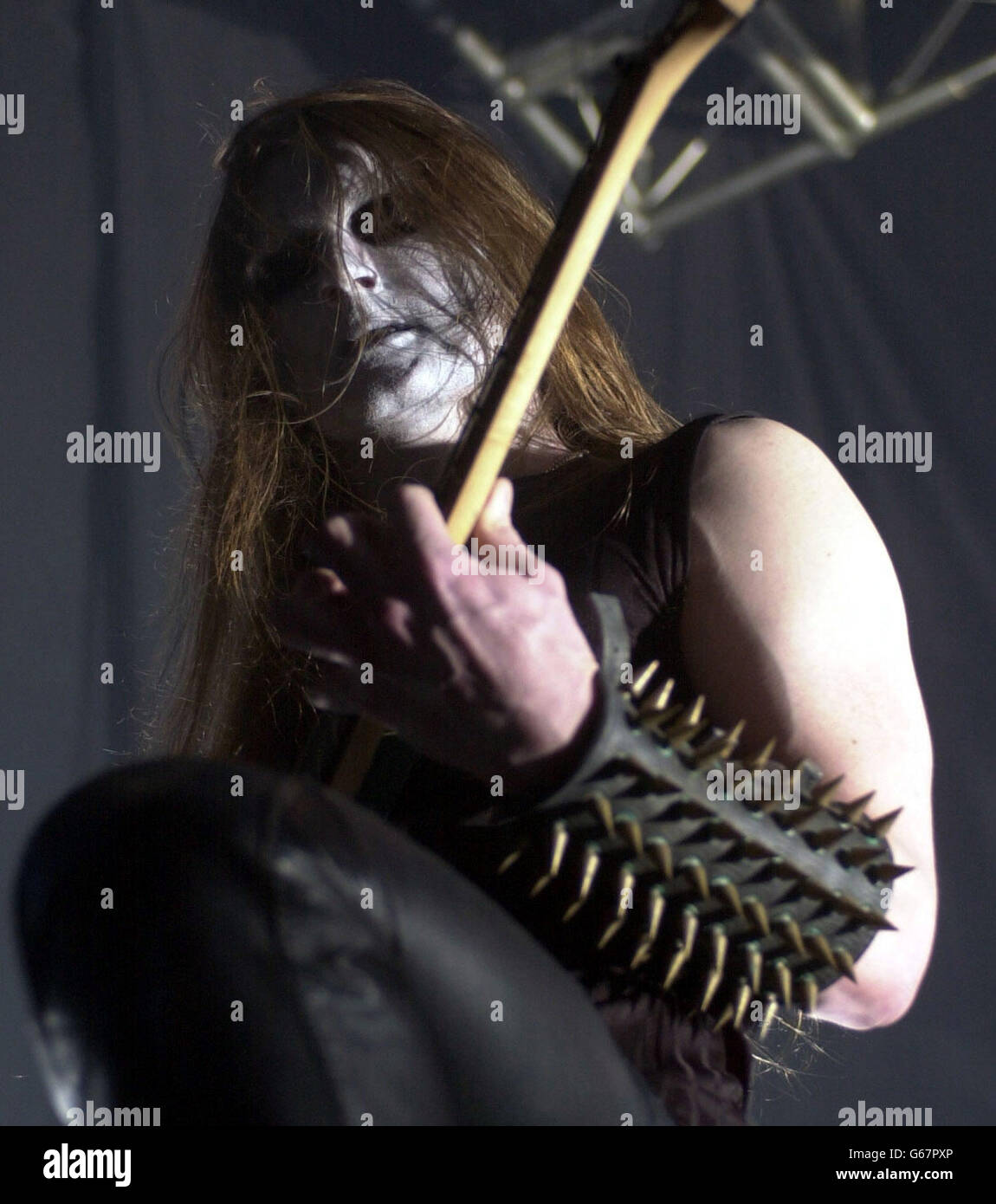 Norwegian 'black metal' band Satyricon's frontman playing at the Temple Bar Music Centre in Dublin. The group known for flirtations with Devil worship and white face paint have been together for just over ten years and are currently touring Europe. Stock Photo
