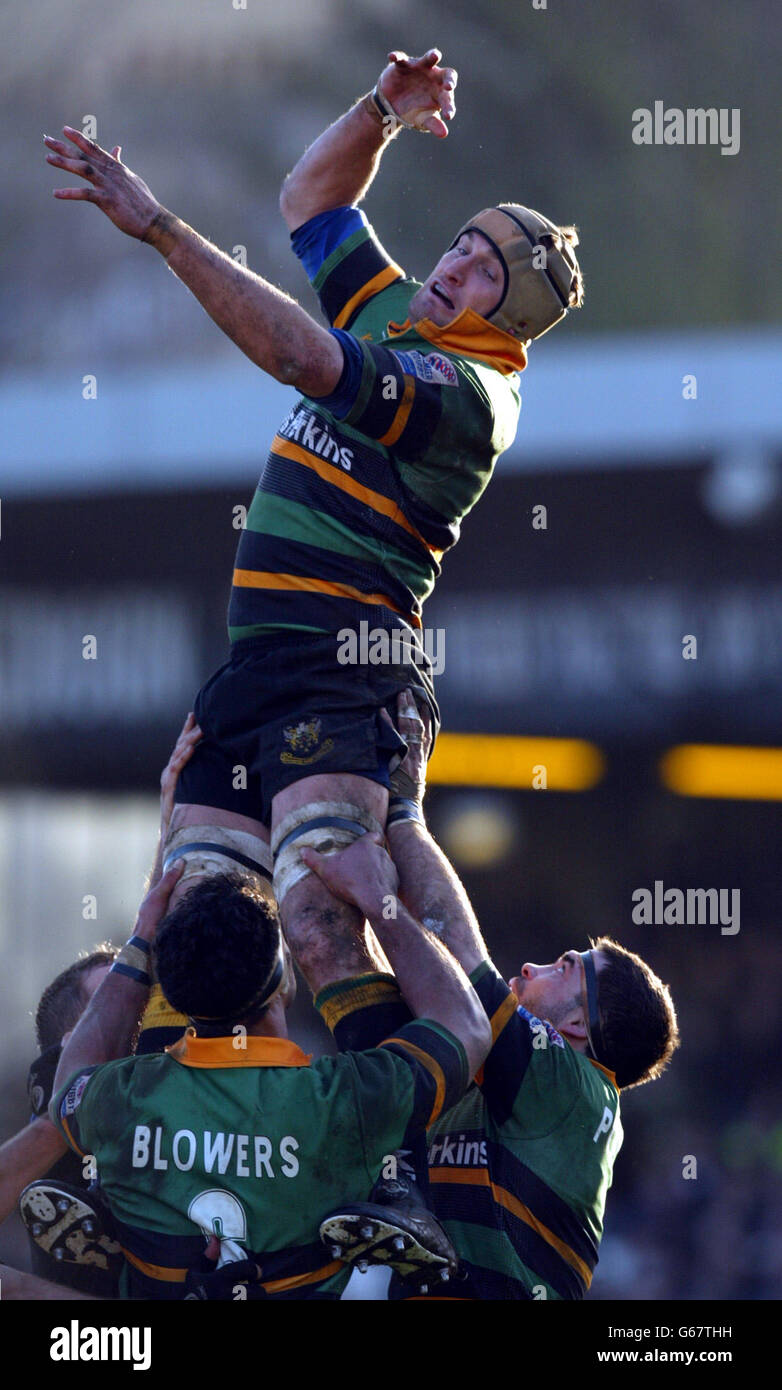 Sport rugby union action jumping lifting mid air arms raised hires