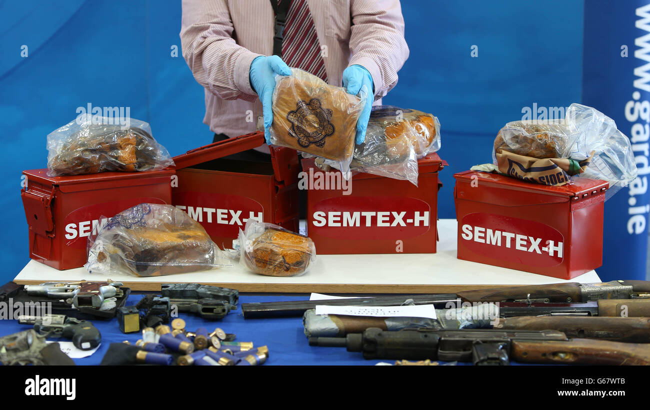 Gardai display arms and explosives recently recovered from dissident republicans in the Dublin area in recent days. Stock Photo