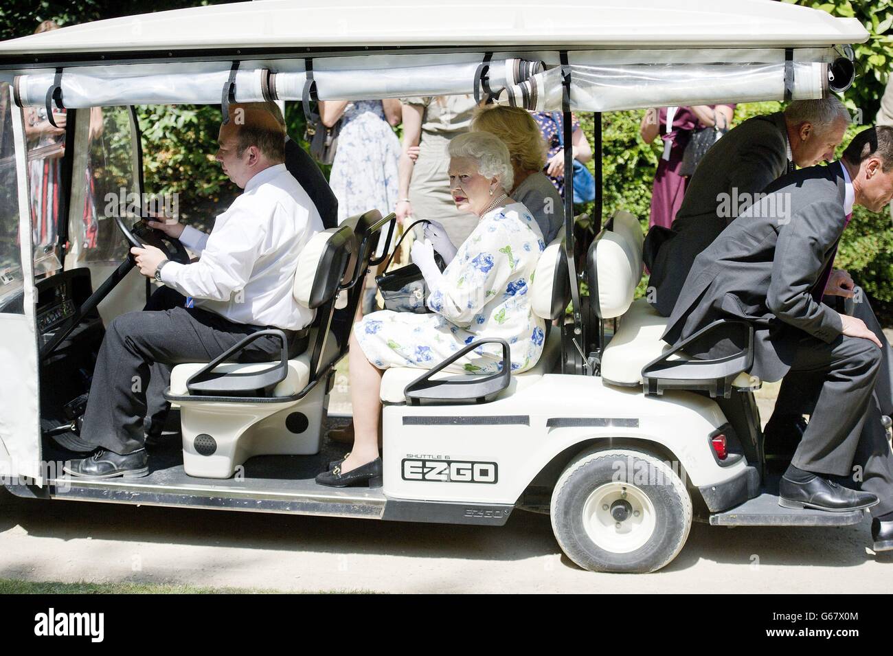 Queen Elizabeth II travels a golf buggy during the Coronation Festival in the of Buckingham Palace, in central London Stock Photo - Alamy
