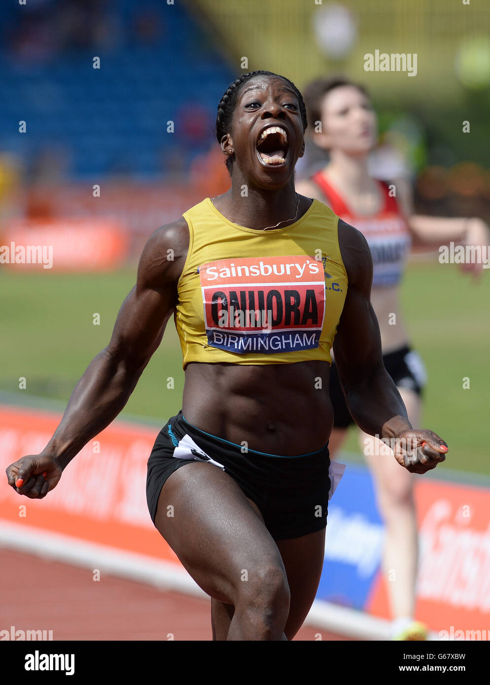 Anyika Onuora celebrates her victory in the Womens 200m Race during the