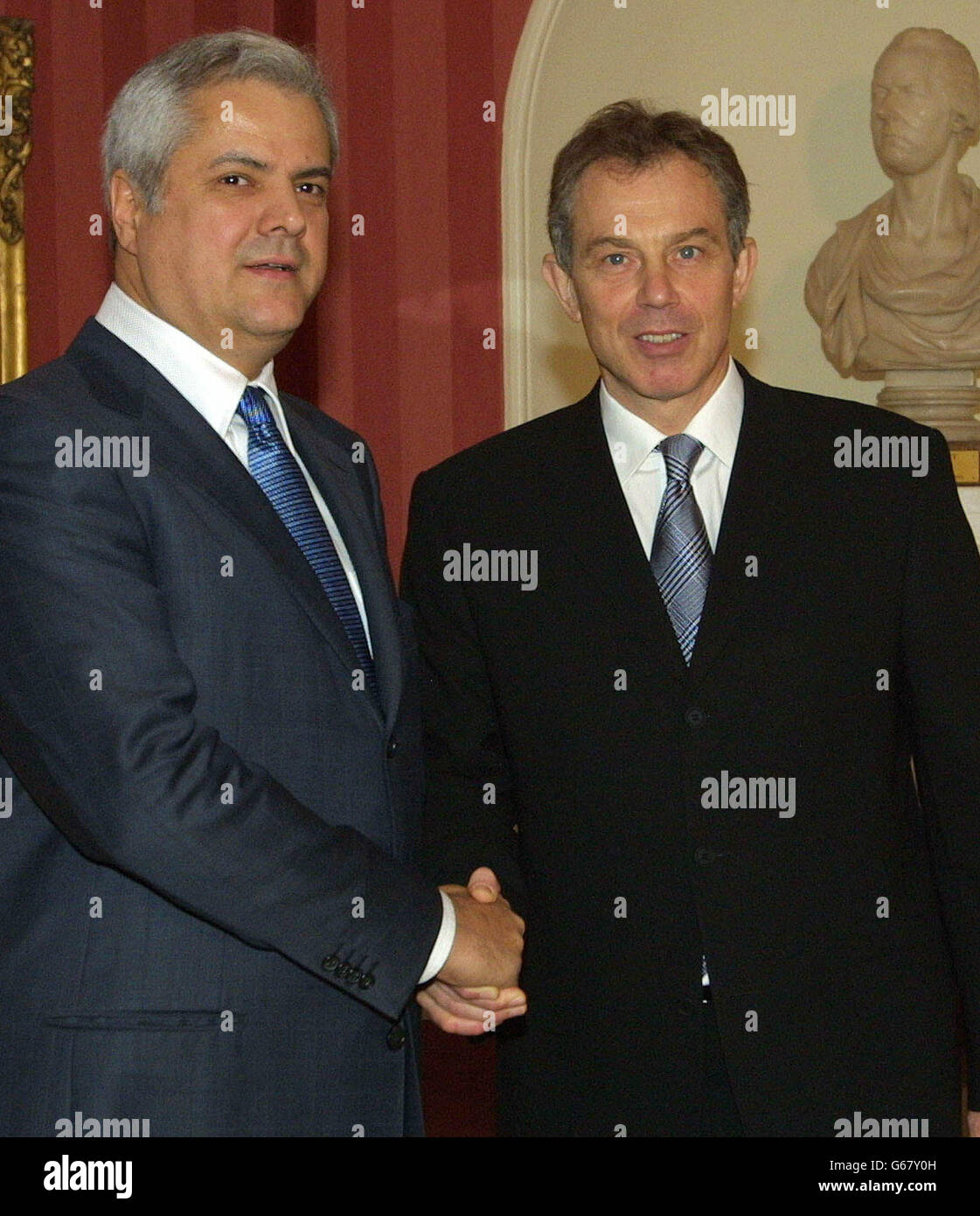 Britain's Prime Minister Tony Blair (right) greets the Romanian Prime Minister Adrian Nastase, at No.10 Downing Street, London. * Mr Blair today warned France and Russia that pledging to veto a second resolution on Iraq would let Saddam Hussein off the hook. 04/04/04: Blair was drawn into the furious political row over immigration amid claims that he struck an agreement with the prime minister of Romania to relax controls on migrants from his country coming into Britain. According to a report in The Sunday Telegraph, Mr Blair promised Nastase he would lift all visa requirements for Romanians Stock Photo