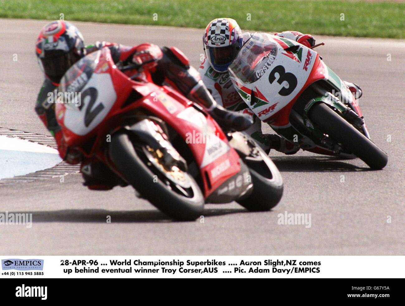 28-APR-96. World Championship Superbikes. Aaron Slight,NZ comes up behind eventual winner Troy Corser,AUS Stock Photo