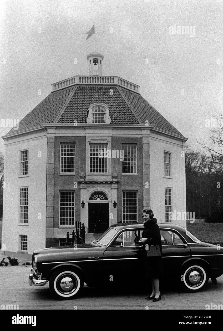 Crown Princess Beatrix of the Netherlands having just driven up to the door of her new home - the tiny octagonal castle of Drakensteyn at Lage Vuursche, near Queen Juliana's palace at Soestdijk. Stock Photo