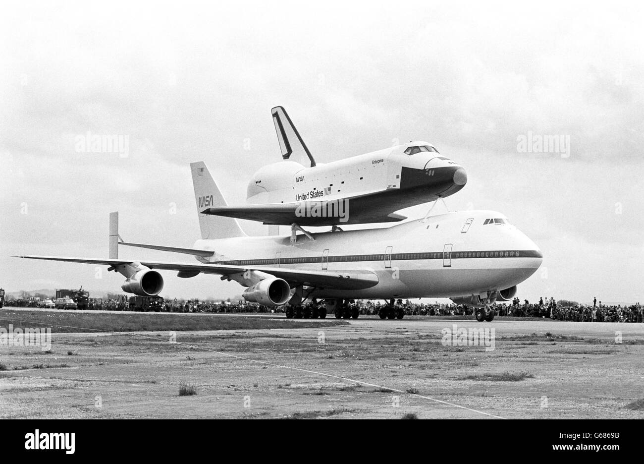 Space Shuttle Orbiter Enterprise, mounted on a modified Boeing 747 shuttle carrier aircraft (SCA) during a brief stop for refuelling at RAF Fairford. The Shuttle is on its way to various display points in Europe, including the Paris Air Show. Stock Photo