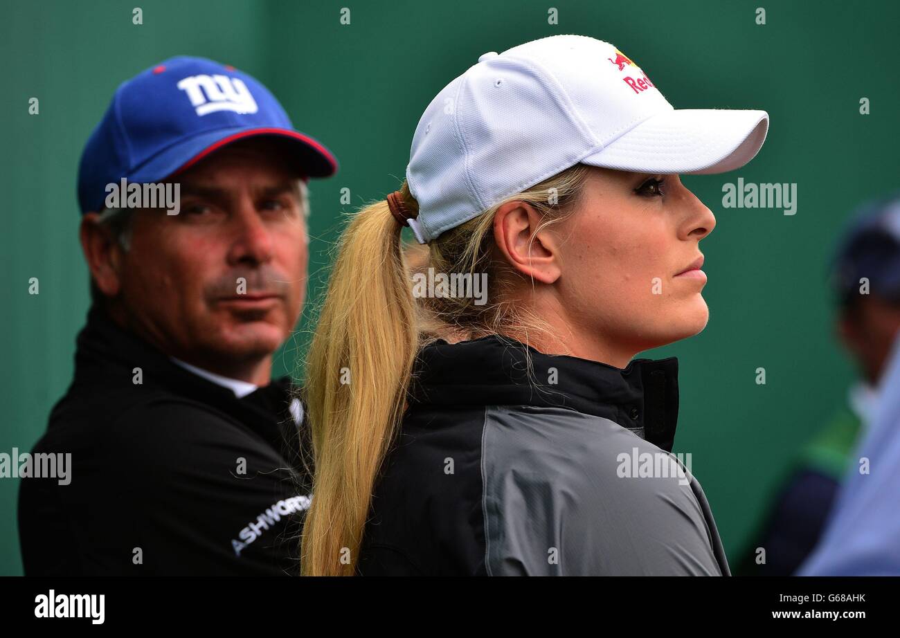 Lindsey Vonn, wife of USA's Tiger Woods and USA's Fred Couples watch the trophy presentation on the 18th green during day four of the 2013 Open Championship at Muirfield Golf Club, East Lothian. Stock Photo