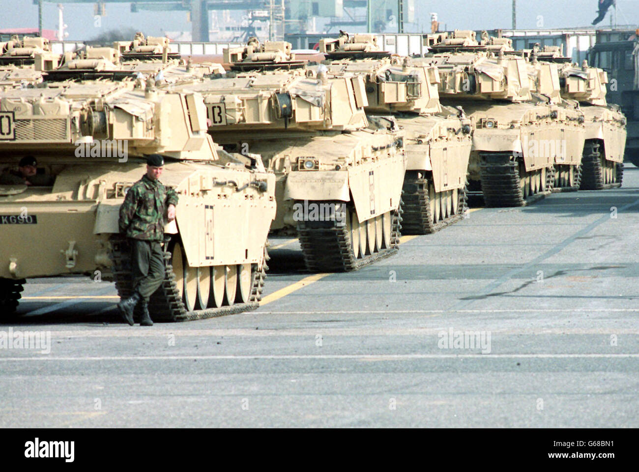 Mark Wells. Soldier Mark Wells, with challenger tanks, waiting for embarkation at Bremerhaven, Germany. Stock Photo