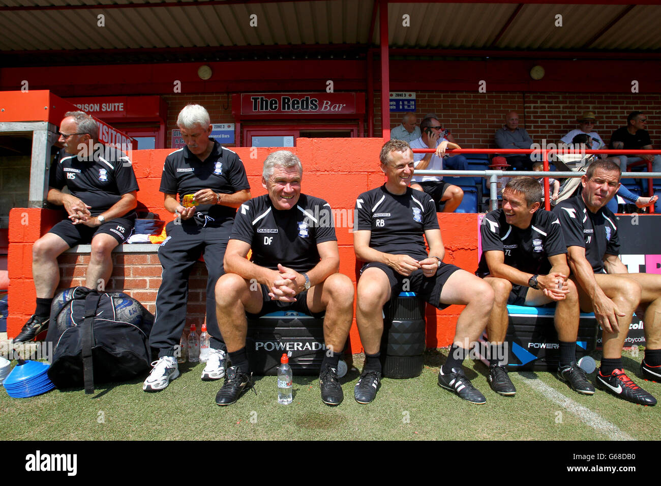 Birmingham City first team coach Derek Fazackerley (centre) sits with