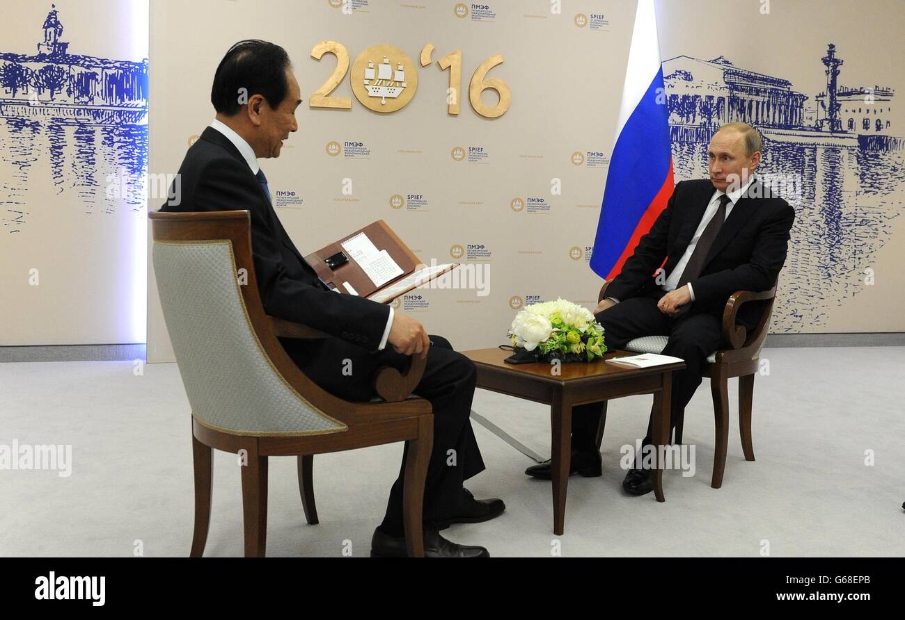 Russian President Vladimir Putin during an interview with Xinhua General Director Cai Mingzhao on the sidelines of the St. Petersburg International Economic Forum June 17, 2016 in St. Petersburg, Russia. Stock Photo