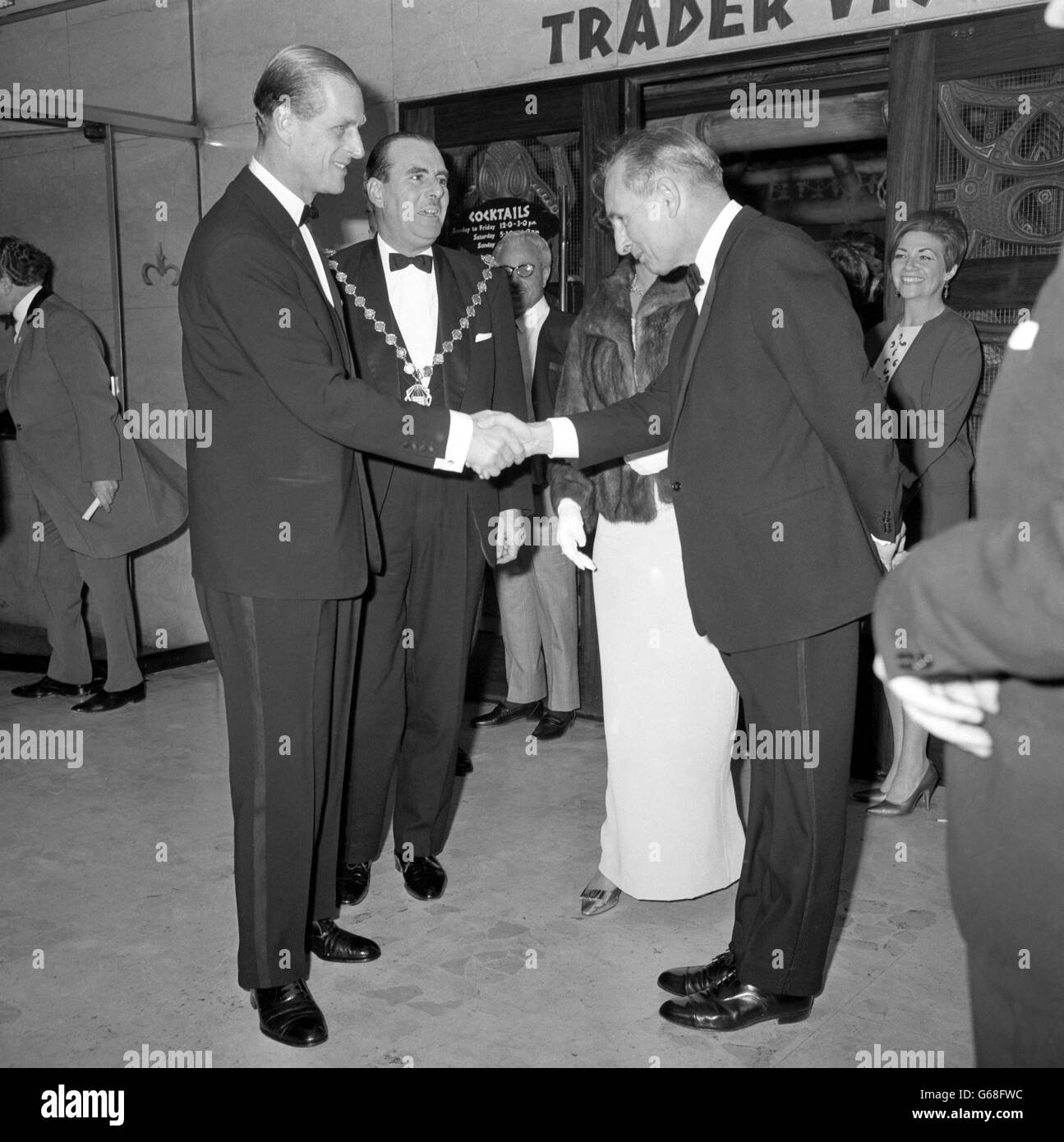 Prince Philip, The Duke of Edinburgh, President of the English Speaking Union, greets Sir Basil Smallpeice, Chairman, at the Hilton Hotel, London, where they were attending the first annual Churchill Memorial Banquet of the English Speaking Union, held on the 92nd anniversary of Sir Winston Churchill's birth. Stock Photo