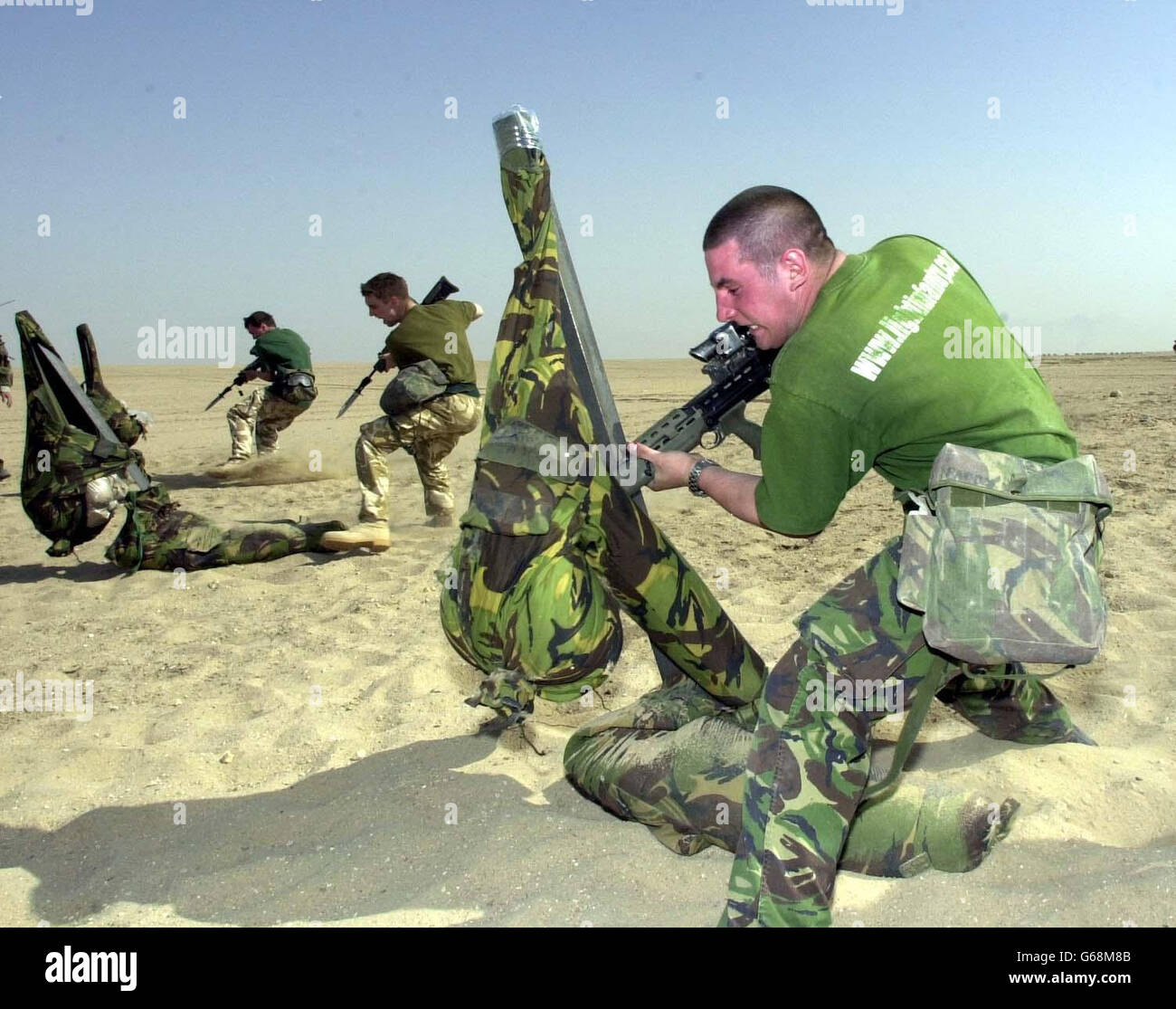 Private Michael Prosser ,19, from South Wales, of A company 1st Battalion Light Infantry 2 RTR battle group, practises close quarter fighting on the Iraq/Kuwait border. Stock Photo