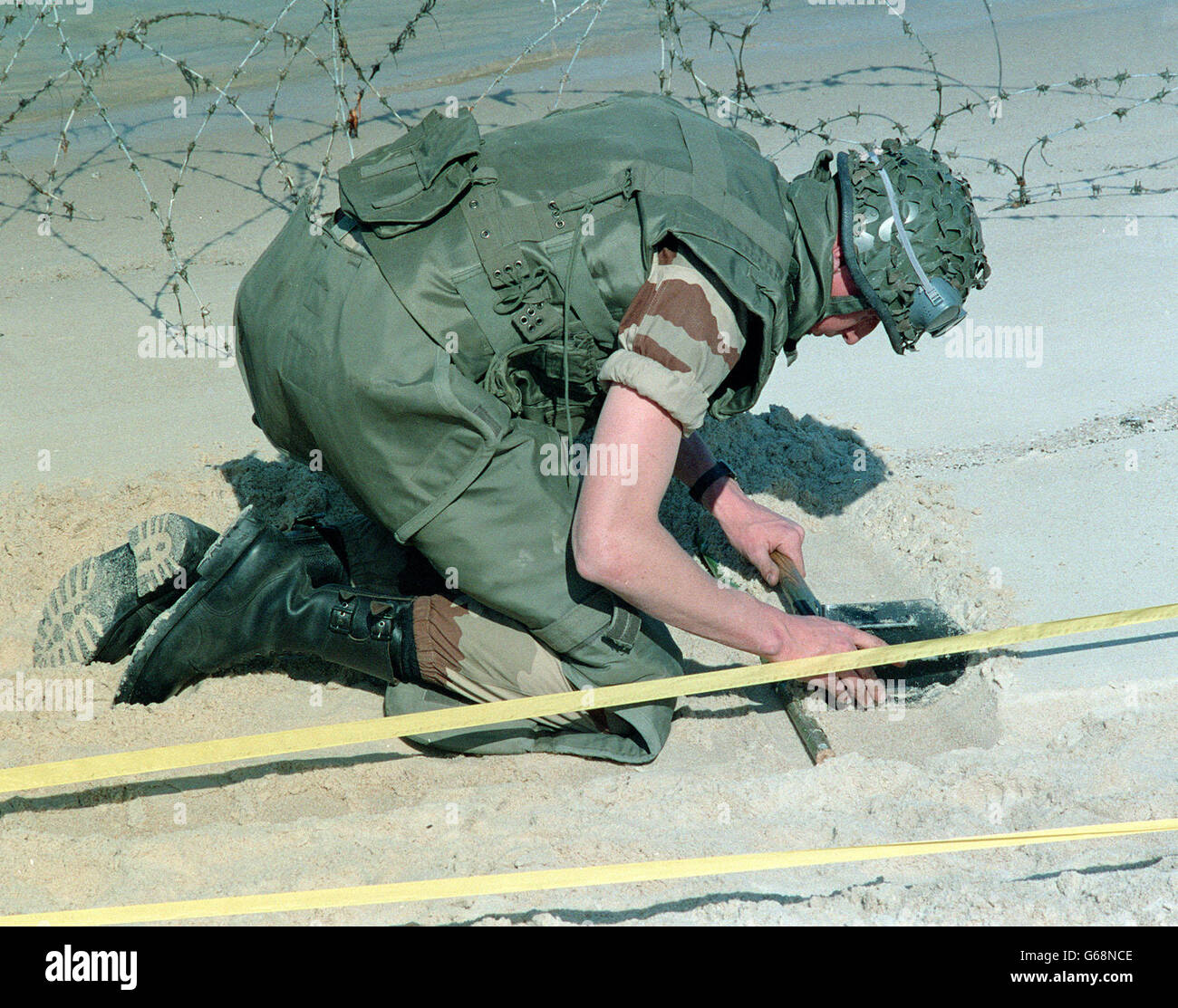 FRENCH SOLDIER CLEARS BEACHES Stock Photo - Alamy
