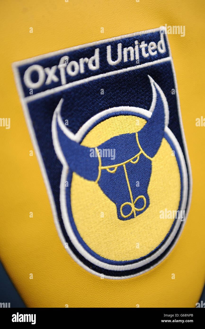 Oxford united badge is seen on the dugout seats hires stock