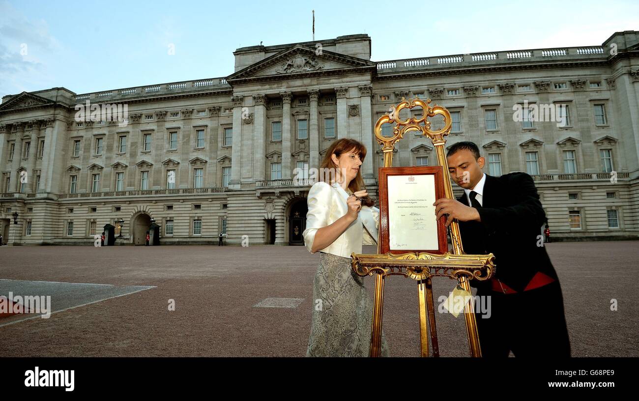 The Queen's Press Secretary Ailsa Anderson with Badar Azim a footman