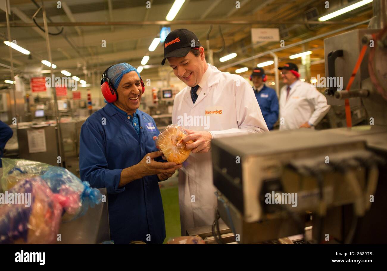 Chancellor visits the Midlands. Chancellor of the Exchequer George Osborne meets staff at Warburtons Bakery in Wednesbury near Birmingham. Stock Photo