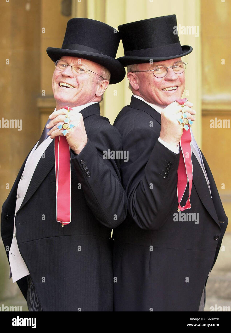 Doctor twins, Professor Raymond Powles, (left) with brother Professor Trevor Powles after receiving their CBE's from the Queen at an Investiture ceremony, Buckingham Palace. Both brothers work at the Royal Marsden hospital in Surrey. Stock Photo