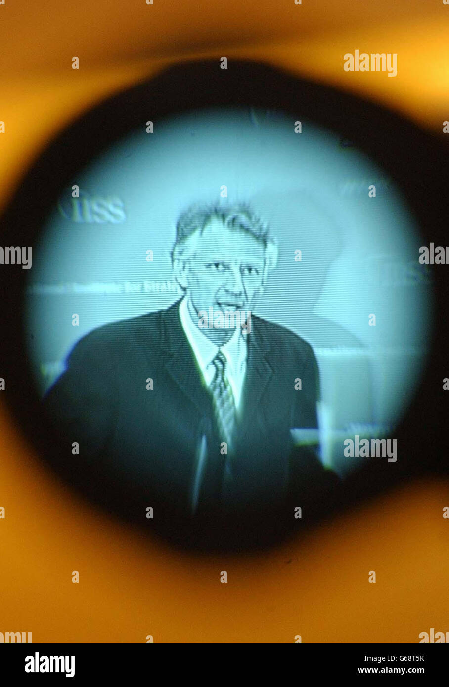 French Foreign Minister Dominique de Villepin is seen through the eyepiece of a TV camera as he gives the Alastair Buchan Memorial Lecture, at the International Institute for Strategic Studies in central London. * He was visiting Britain for the first time since the outbreak of war in Iraq. France has been fiercely opposed to the US and British-led military action against Saddam Hussein's regime. Stock Photo