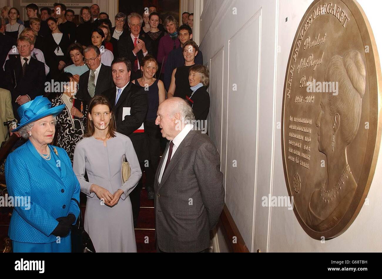 Britain's Queen Elizabeth II, with her niece Lady Sarah Chatto, (the daughter of the late Princess Margaret) admire the work of the sculptor Rizello (right), a memorial plaque dedicated to Princess Margaret, in the Royal Opera house. * The Queen toured the newly built Royal Ballet school, which she officially opened in Covent garden this afternoon. Stock Photo