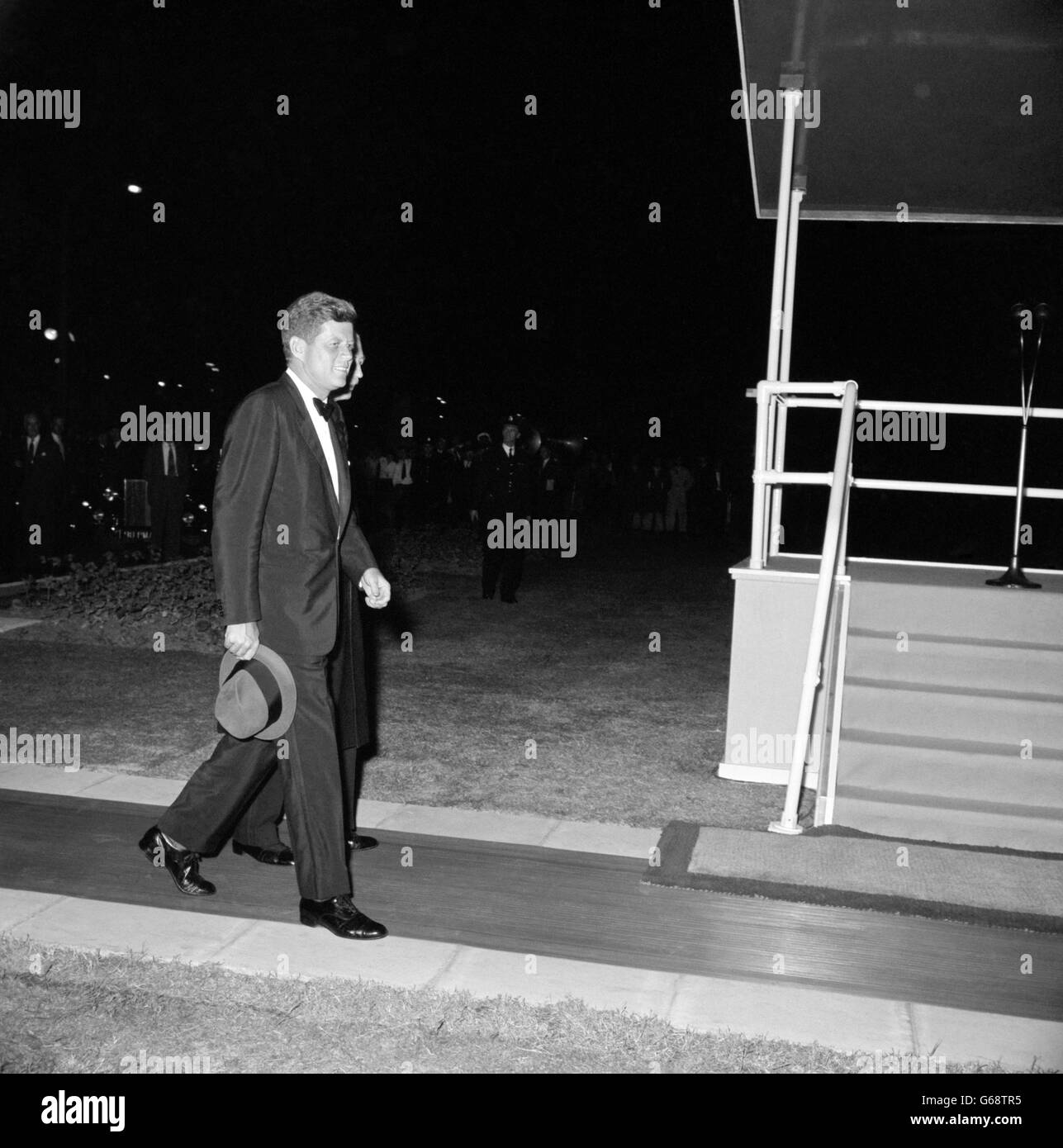 President John Kennedy of America pictured at London Airport (Heathrow) shortly before he left for home late last night, following his whirlwind visit to the British capital. His wife, Mrs. JACQUELINE KENNEDY, was staying on in London before leaving for a visit to Greece. Stock Photo