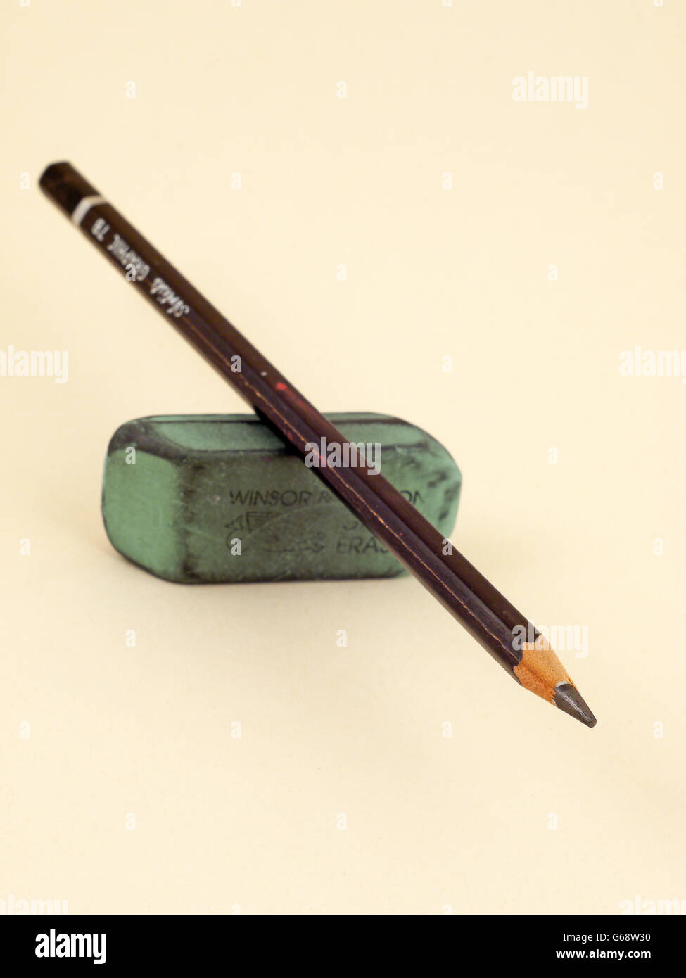 Pencil and green eraser Stock Photo Alamy