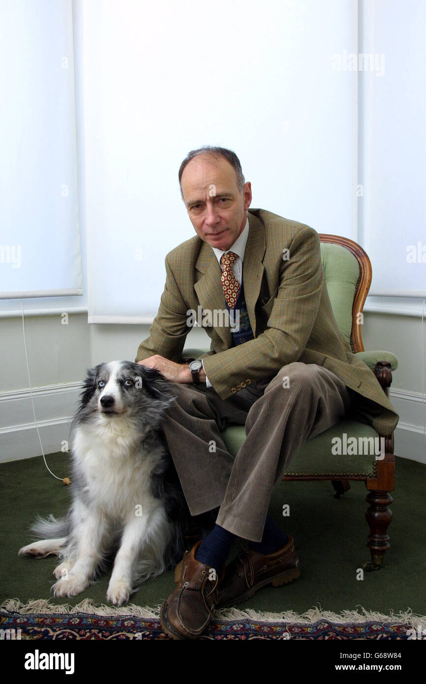 Peter J Conradi, author of 'Iris Murdoch: A Life' with his Blue Eyed Collie, Cloudy, who was the model  for the dog 'Anax' in  Murdoch's novel 'The Green Knight' (1993), at his home in south west London. Stock Photo