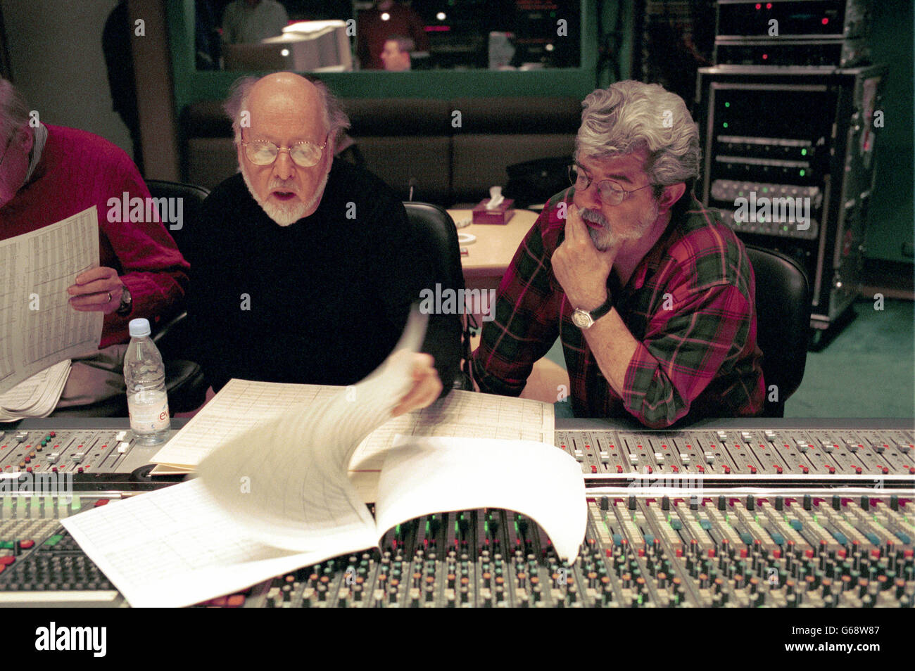 Composer John Williams working, with George Lucas and the London Symphony Orchestra yesterday, January 20th 2002, during the recording of the music for the Star Wars movie Episode II – Attack of the Clones, at London's Abbey Road studios. Stock Photo