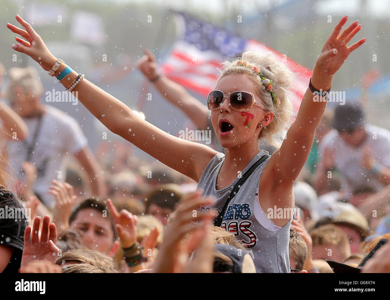 A music fan at the main stage during the 20th T in the Park music festival at Kinross. Stock Photo