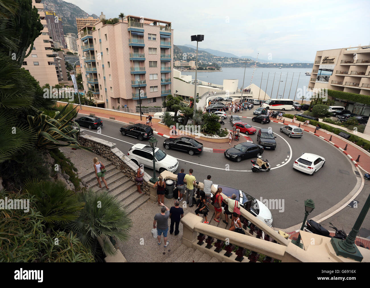 Car drivers make their way around the Fairmont hairpin, a famous part of the Monaco formula 1 grand prix circuit. PRESS ASSOCIATION Photo. Picture date: Thursday July 18, 2013. Photo credit should read: Dave Thompson/PA Wire Stock Photo