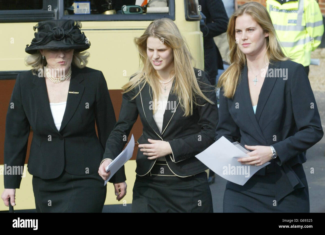 Major Ronald Ferguson's widow Sue (left) and daughters Eliza (centre) and Alice arriving at All Saints Church in Odiham in Hampshire, for the Service of Thanksgiving and funeral of Major Ferguson. Stock Photo