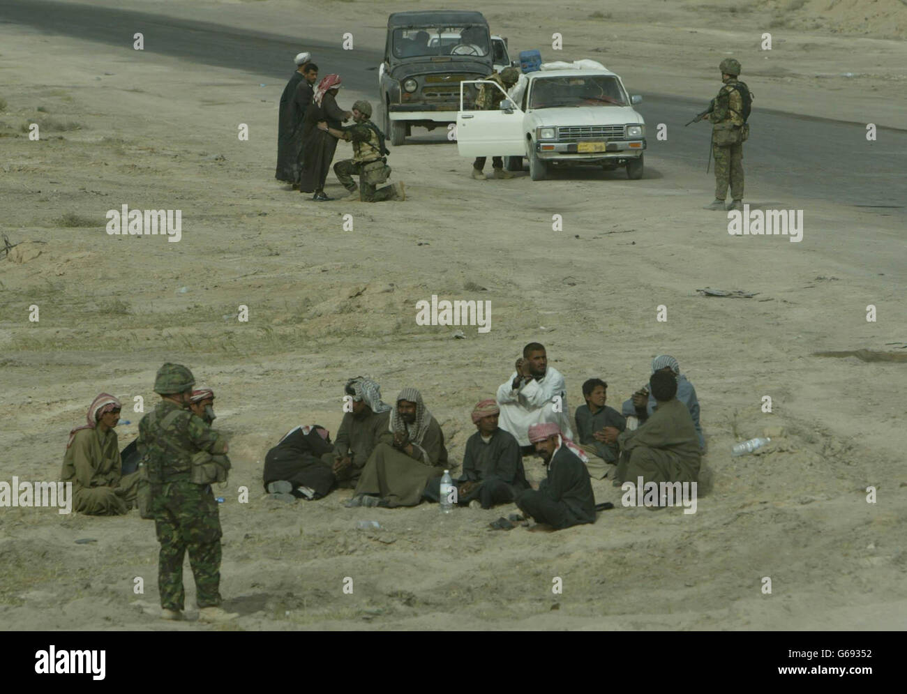 British soldiers Search Iraqis Stock Photo
