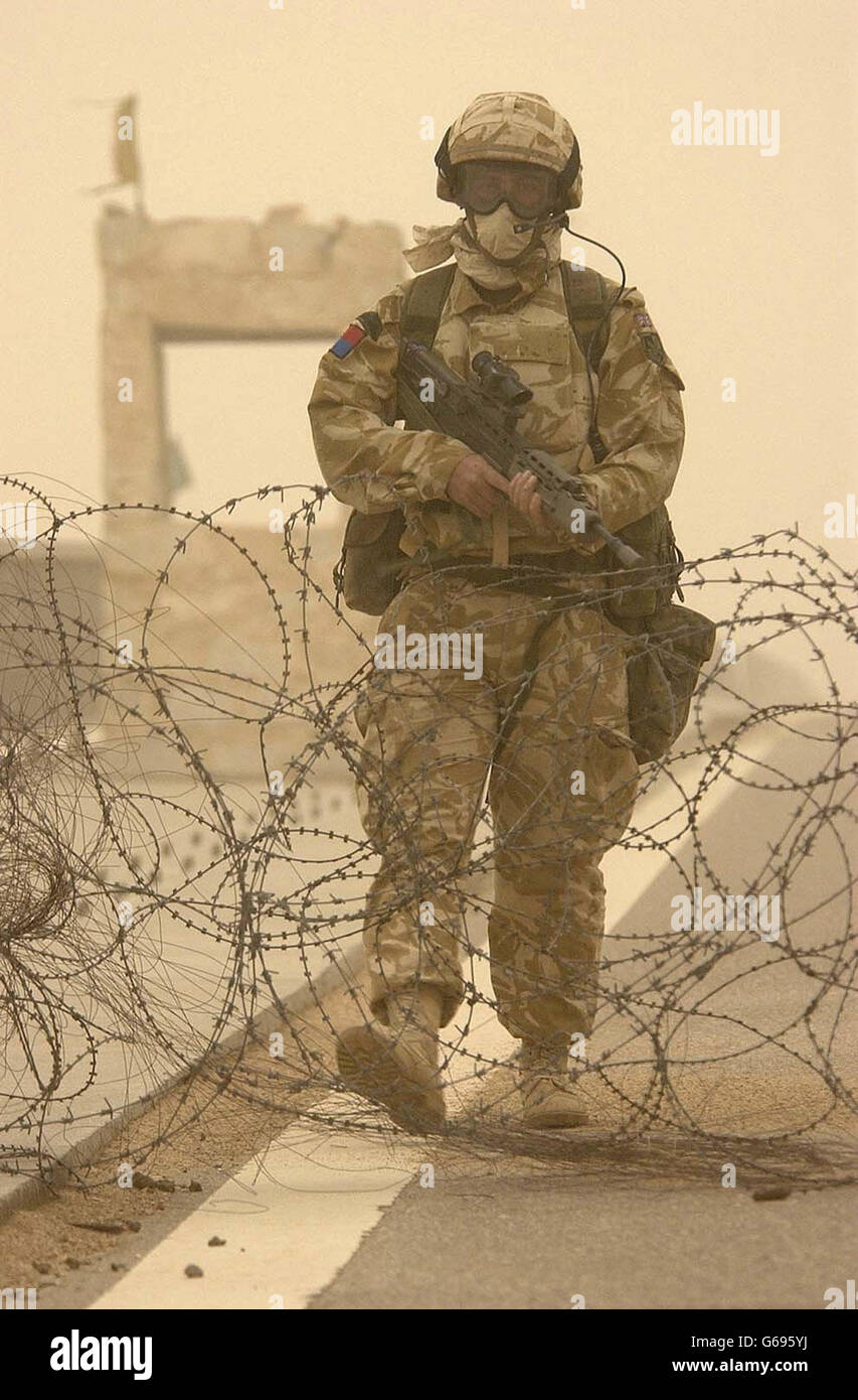 A member of the Household Cavalry on highway checkpoint patrol during a severe sandstorm in Southern Iraq. Defence analysts sounded a note of caution about coalition claims that the conflict in Iraq was entering a decisive stage . * The commander of British forces, Air Marshal Brian Burridge, made the comment as US troops fought Republican Guards near the holy city of Karbala, some 50 miles south of the capital, Baghdad. British troops were also continuing their efforts to secure the second city of Basra. Stock Photo