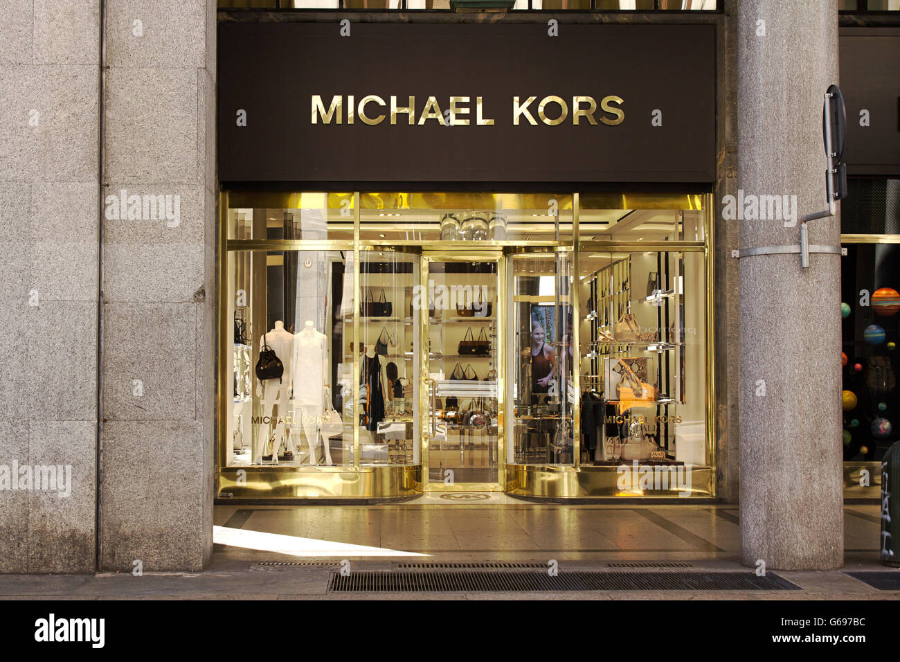 Michael Kors women luxury high fashion and accessories shopping windows in  Turin fashion avenue, Via Roma Stock Photo - Alamy