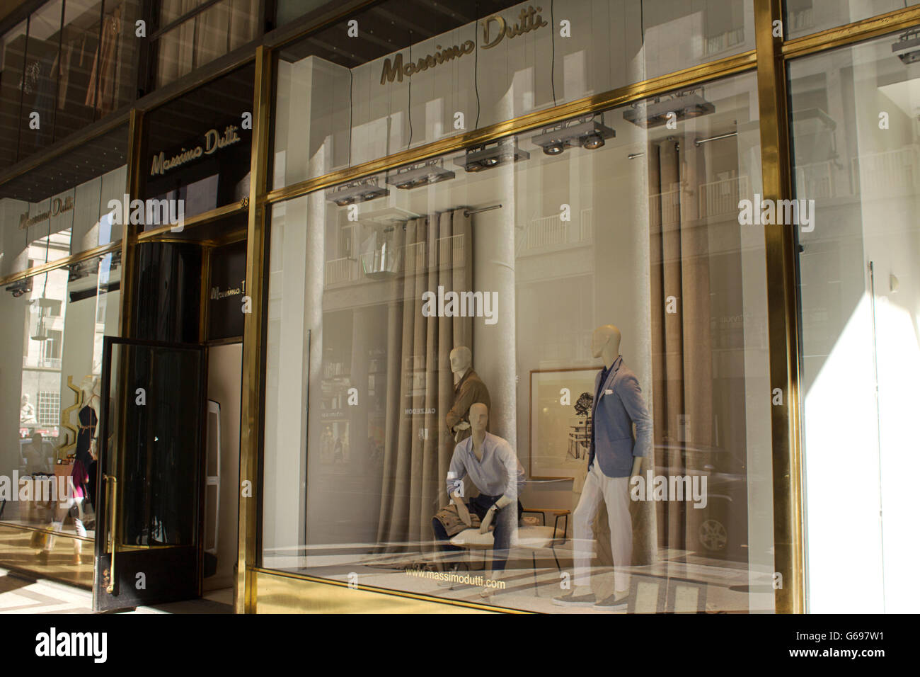 Massimo Dutti men luxury high fashion and accessories shopping windows in  Turin fashion avenue, Via Roma Stock Photo - Alamy