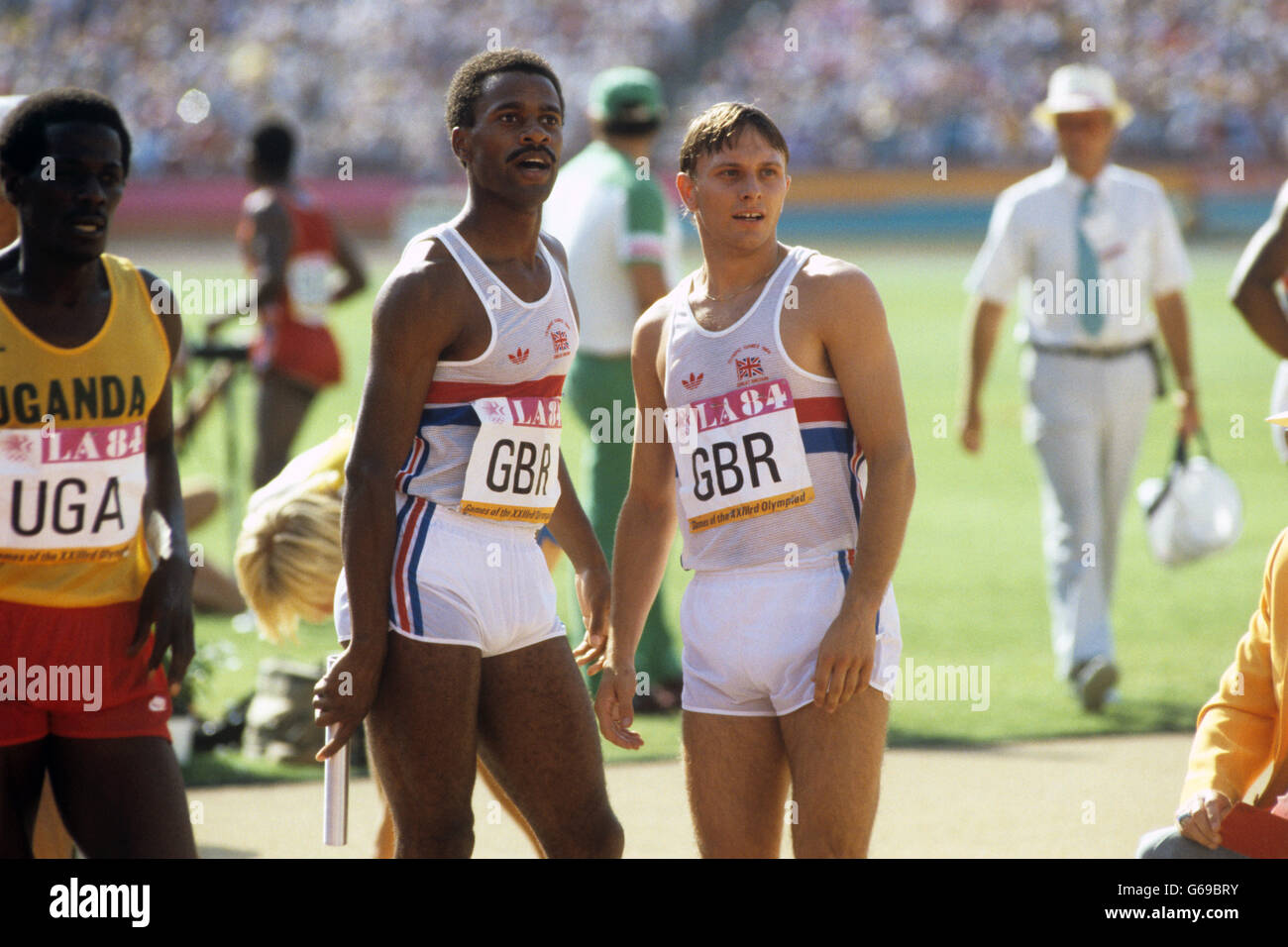 Athletics - Los Angeles Olympic Games 1984 - Men's 4 x 400m Relay. Great Britain's Phil Brown (l) and Todd Bennett (r) after winning silver in the Men's 4 x 400m relay at the Los Angeles Olympics. Stock Photo