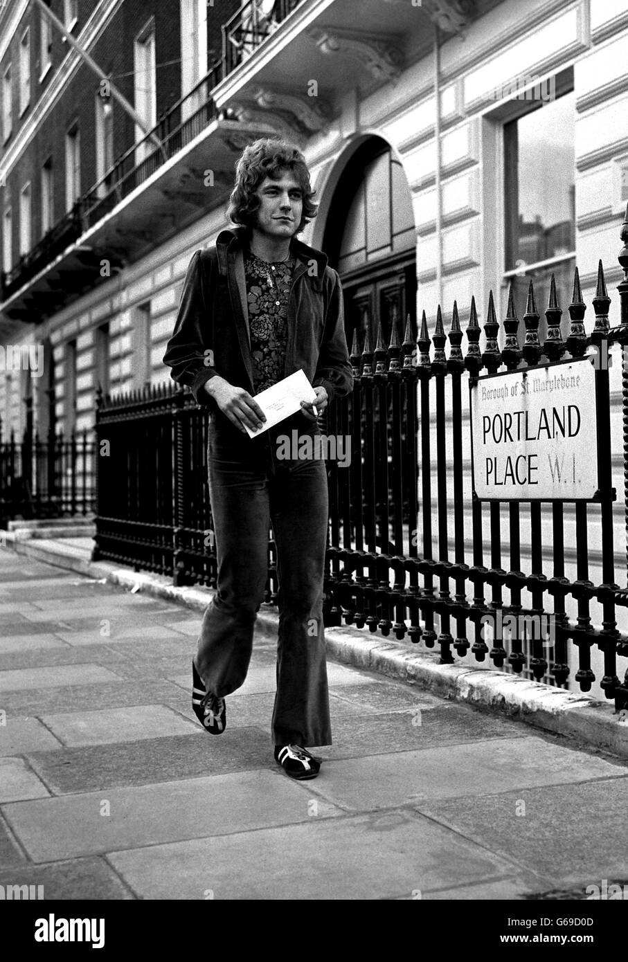 Robert Plant, a nineteen year old Wolverhampton pop-singer visits the office of the Charge d'Affaires of the Republic of China in Portland Place, London, to hand in a letter expressing his interest in the cultural revolution, currently taking place in that country, and offering his services and that of the Band of Joy to the Republic. In his letter he said: 'We are prepared to play for a period of time, free of charge, as we feel very strongly about a united world.' Stock Photo