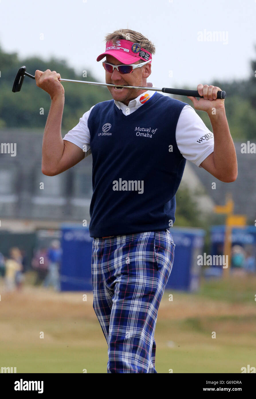 England's Ian Poulter bites his putter during day four of the 2013 Open Championship at Muirfield Golf Club, East Lothian. Stock Photo