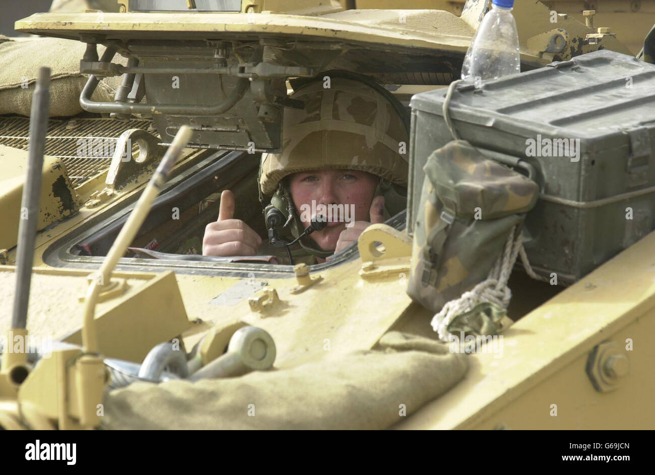 A member of the 7th Armoured Brigade, the Desert Rats, as residents ...