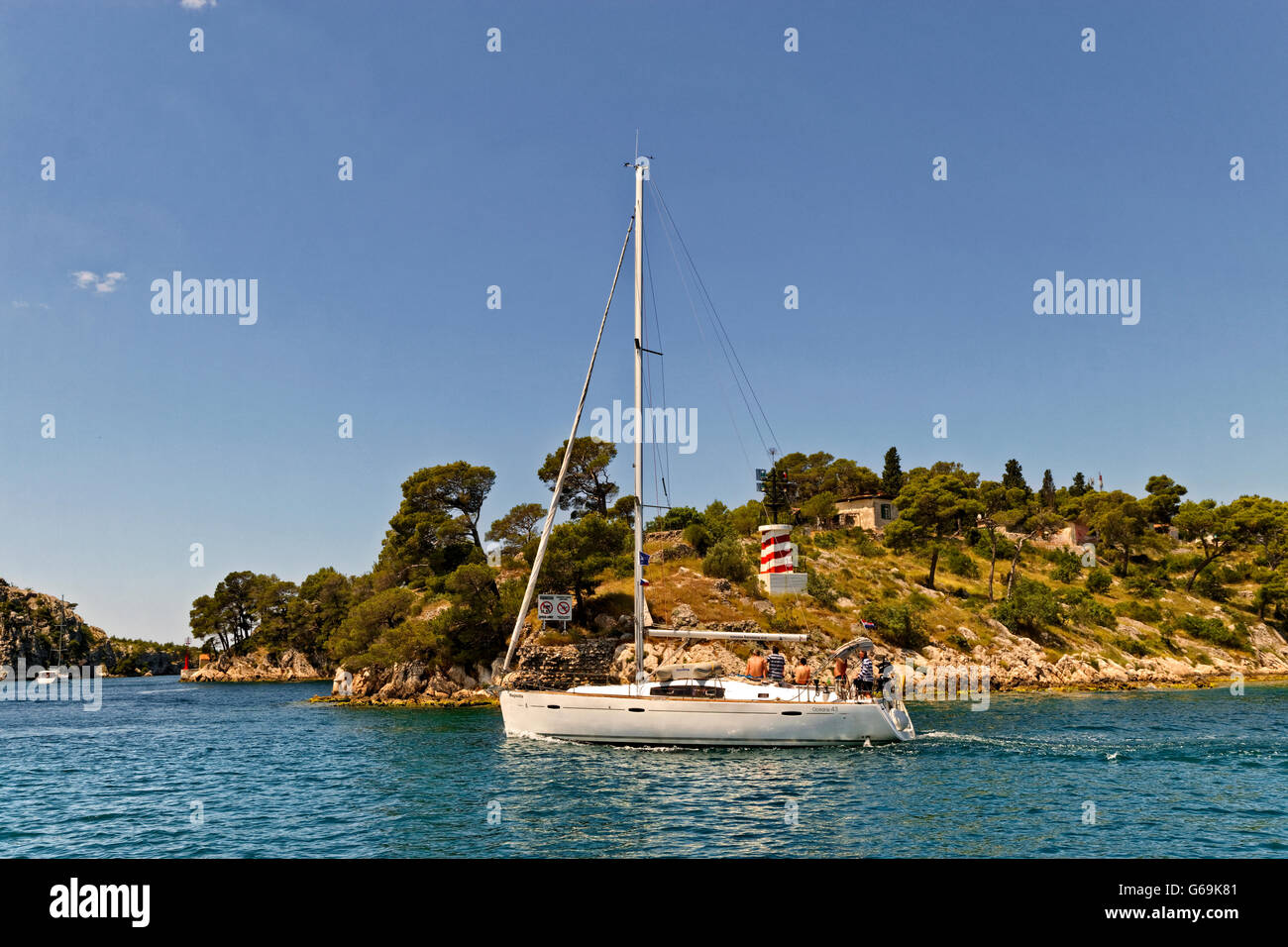 Cruising yacht motoring near Sibenik on the Cikola River, Dalmatia, Croatia. Stock Photo