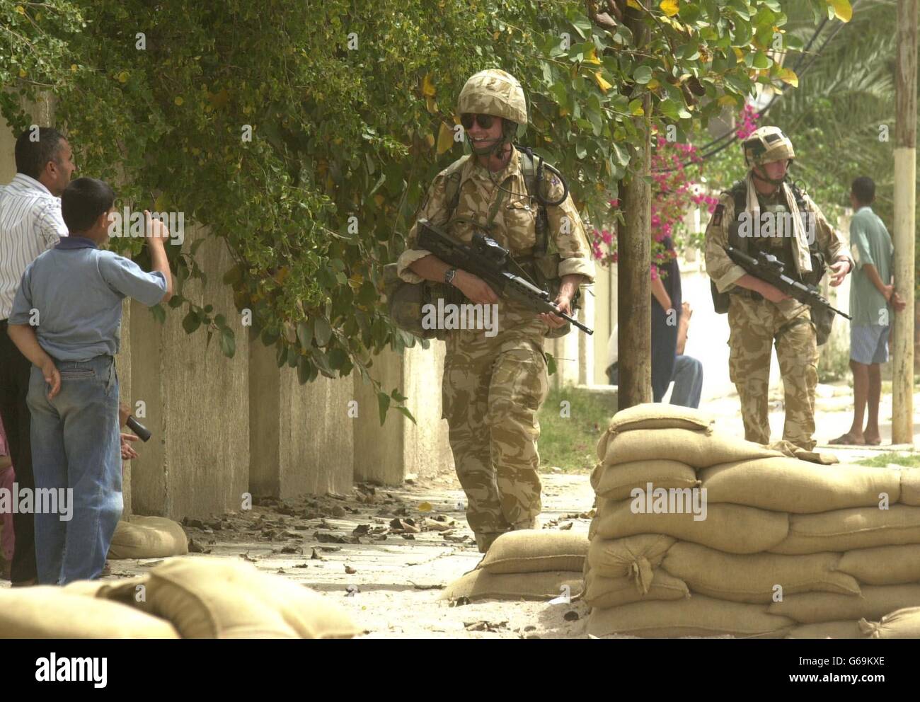 Members of the Irish Guards patrol the streets of Basra. Stock Photo