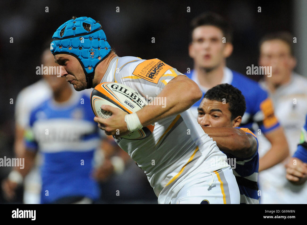 Bath Rugby 7's Raymond Bishop (right) tackles Worcester Warriors 7's Richard De Carpentier during the Group A match of the J.P. Morgan Asset Management Premiership Rugby 7's at Kingsholm Stadium, Gloucester. Stock Photo