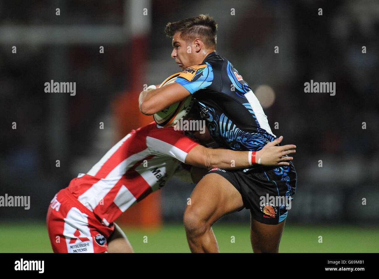 Exeter Chiefs 7's Rob Coote in action during the Group A match of the J.P. Morgan Asset Management Premiership Rugby 7's at Kingsholm Stadium, Gloucester. Stock Photo
