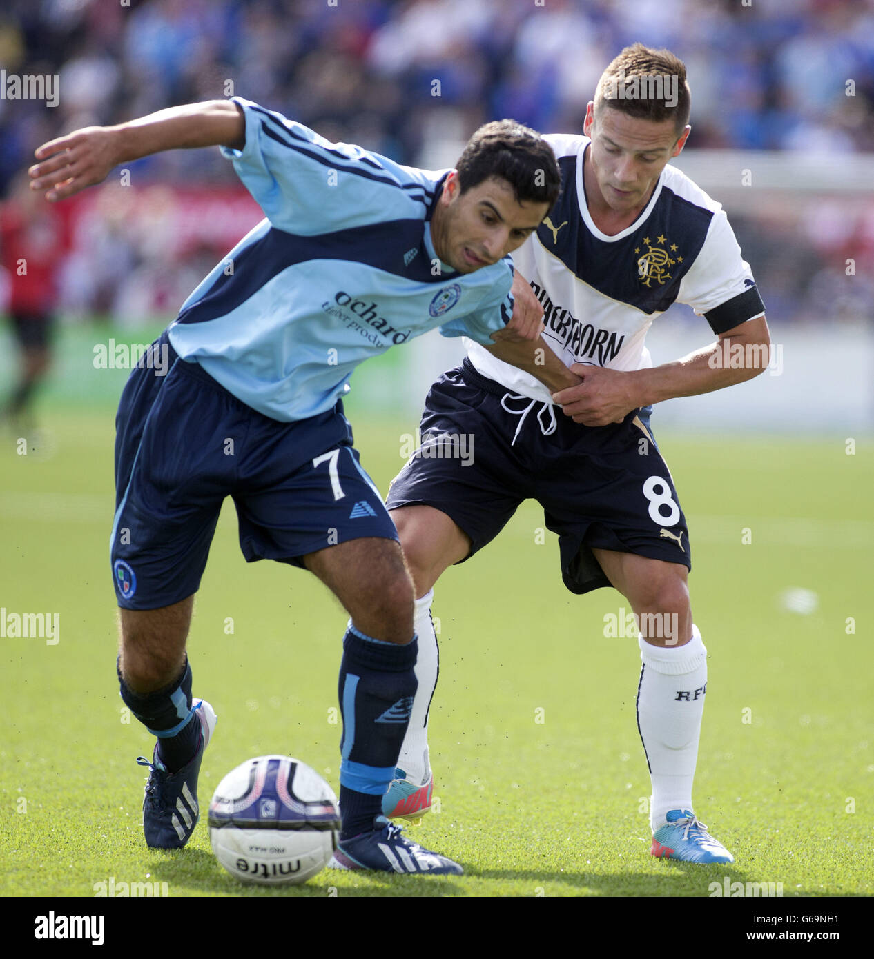 Rangers' Ian Black (right) and Forfar Athletic's Omar Kader in action during the Scottish Communities League Cup, First Round match at Station Park, Forfar. Stock Photo