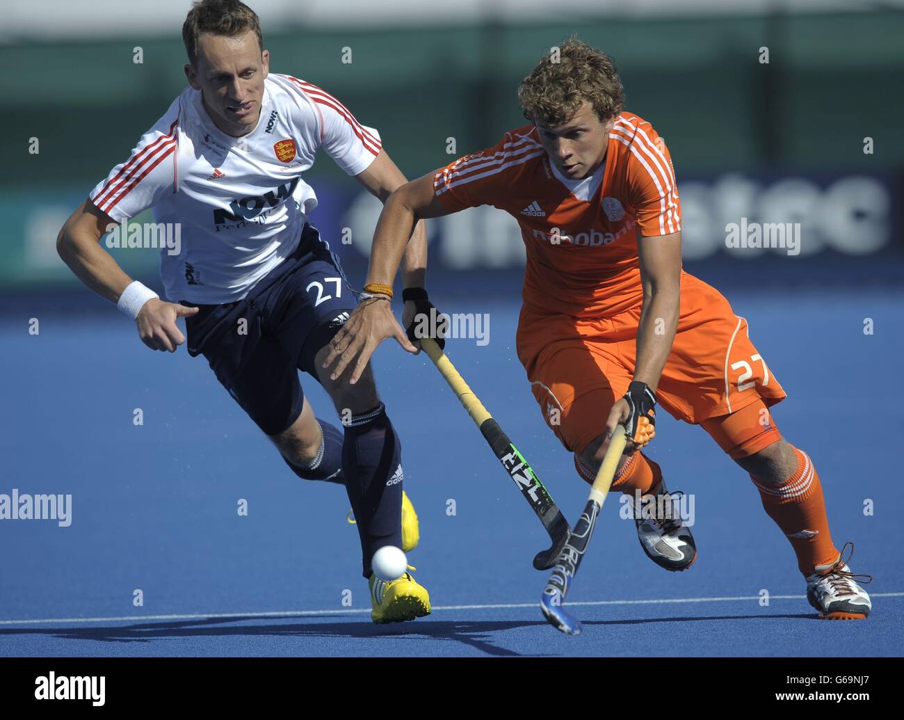 England's Dan Fox challenges with Netherlands' Constantijn Jonker during the second game of the NOW:Pensions Nations Cup at Wakefield Hockey Club, Wakefield. Stock Photo